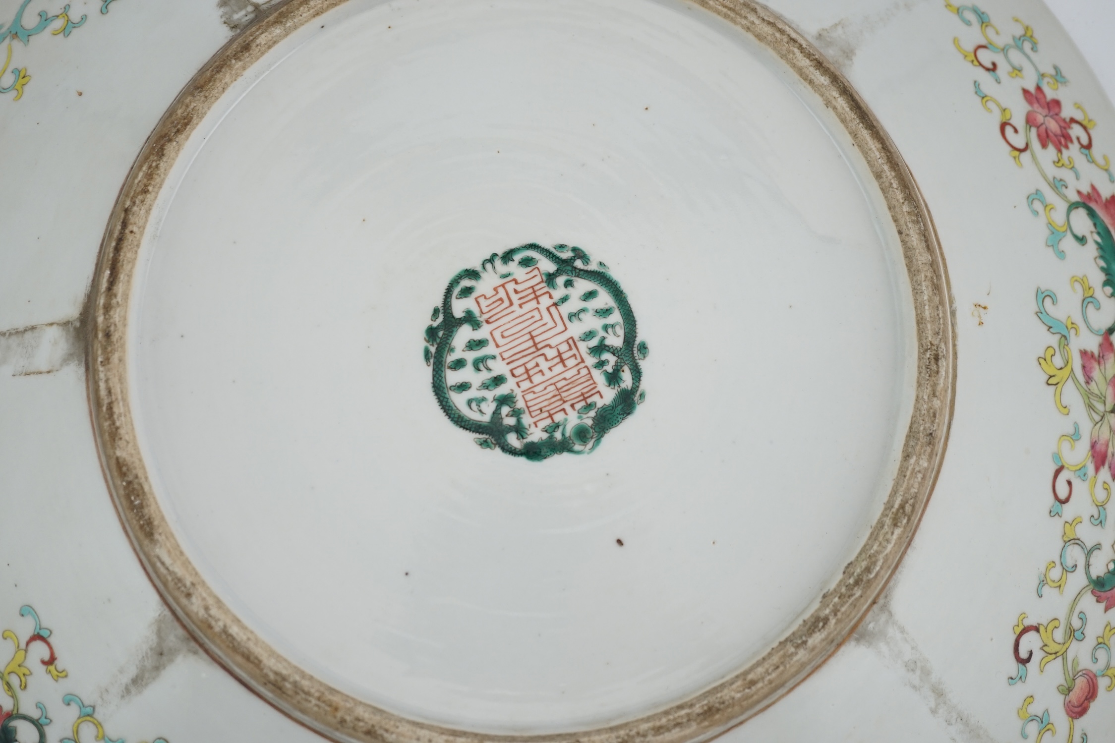 A Chinese yellow ground ‘dragon’ dish, late 19th century, minor damage